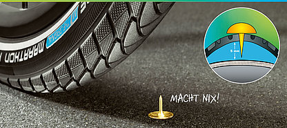 Selbst Heftzwecken können den Schwalbe Marathon Plus nicht durchstechen Selbst Heftzwecken können den Schwalbe Marathon Plus nicht durchstechen